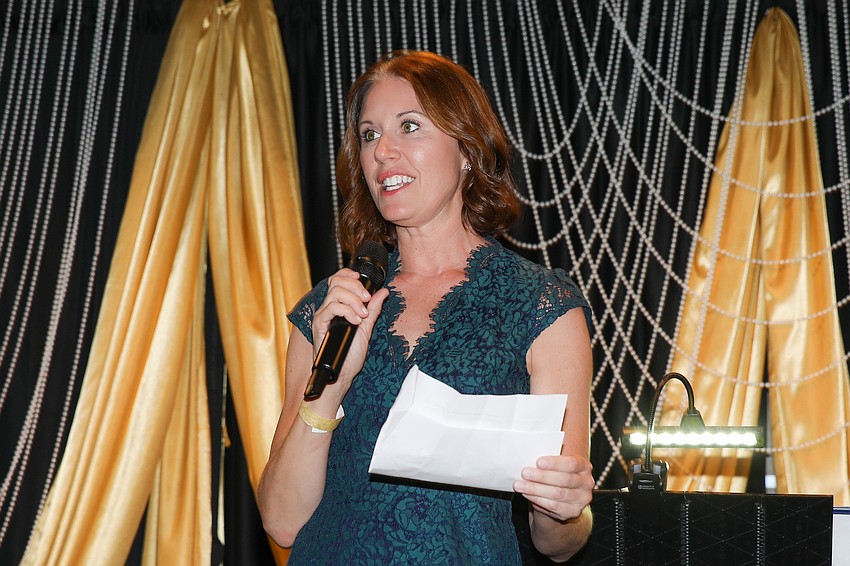 Lauren Bennett Hersh gives remarks on behalf of the Gulf Coast Community Foundation.