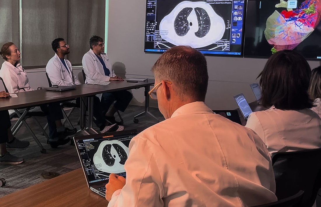 The multidisciplinary lung cancer detection and treatment team at SMH meets once a week.
