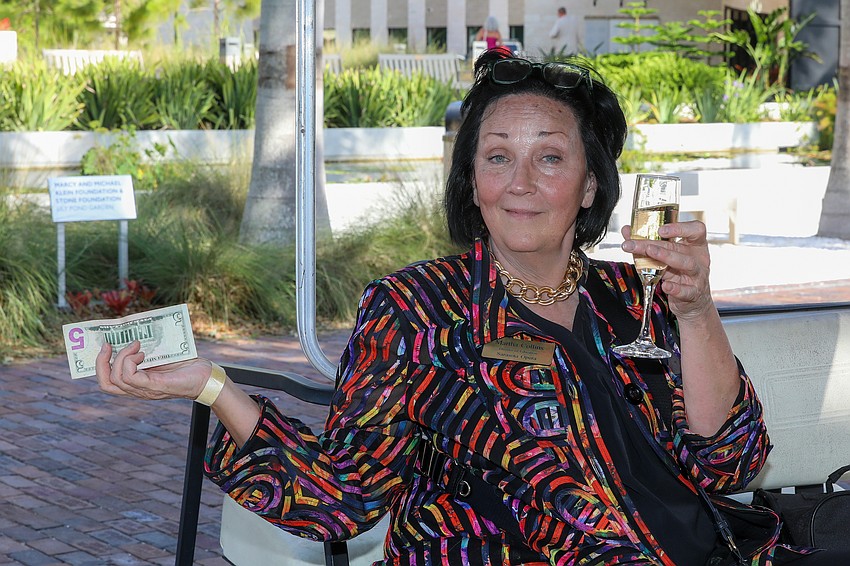 Martha Collins enjoys a champagne-infused ride on the Selby Six-Seater.