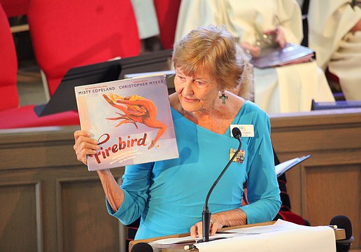 Beverly Sutton, director of the outgoing Reading Buddies program that paired Christ Church of Longboat Key volunteers with students from Bradenton schools, speaks to the impact the after-school program had on everyone involved. Volunteers shared their appreciation for teachers and students at the April 12 service and reception.