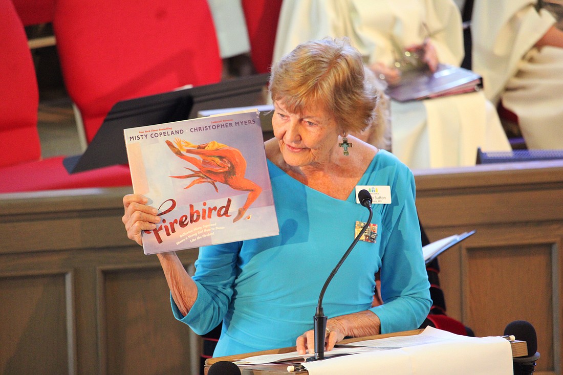 Beverly Sutton, director of the outgoing Reading Buddies program that paired Christ Church of Longboat Key volunteers with students from Bradenton schools, speaks to the impact the after-school program had on everyone involved. Volunteers shared their appreciation for teachers and students at the April 12 service and reception.