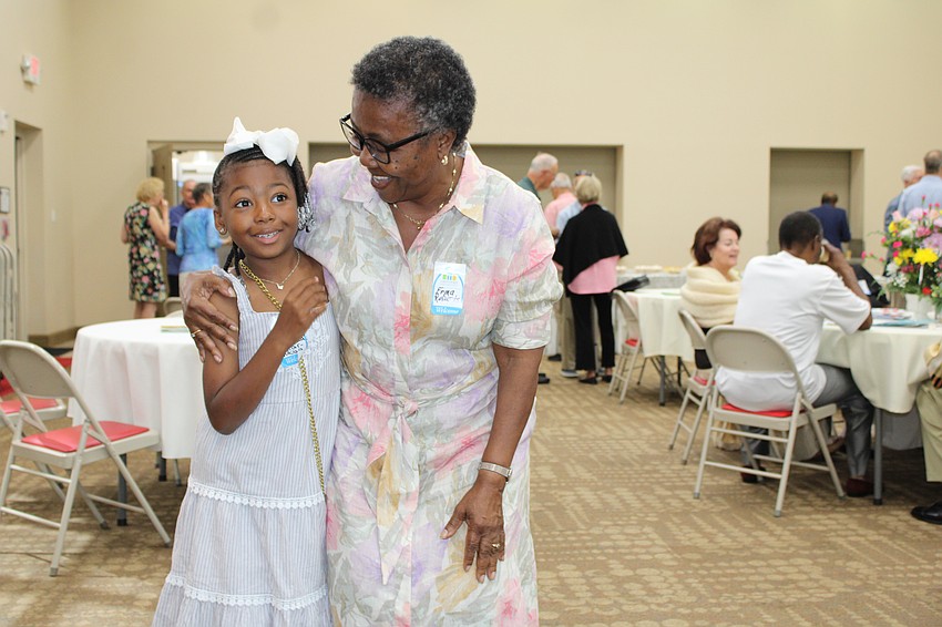 Reading Buddies participant Saleeah Kofar-Naisa, 8, and teacher Erma Roberts, visited Christ Church of Longboat Key on April 12 for a special service and reception recognizing the teachers who contributed to the after-school literacy program that is coming to an end.