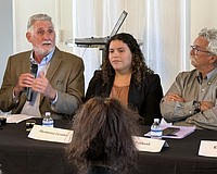 From left, Jon Thaxton speaks to members of the Downtown Sarasota Condominium Association as Sarasota Capital Projects Manager Alvimarie Corales and local historian Jeff LaHurd look on.