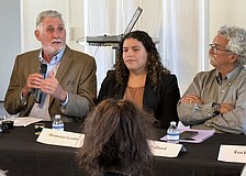 From left, Jon Thaxton speaks to members of the Downtown Sarasota Condominium Association as Sarasota Capital Projects Manager Alvimarie Corales and local historian Jeff LaHurd look on.