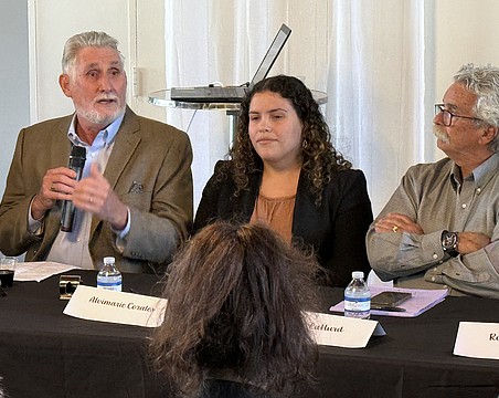 From left, Jon Thaxton speaks to members of the Downtown Sarasota Condominium Association as Sarasota Capital Projects Manager Alvimarie Corales and local historian Jeff LaHurd look on.