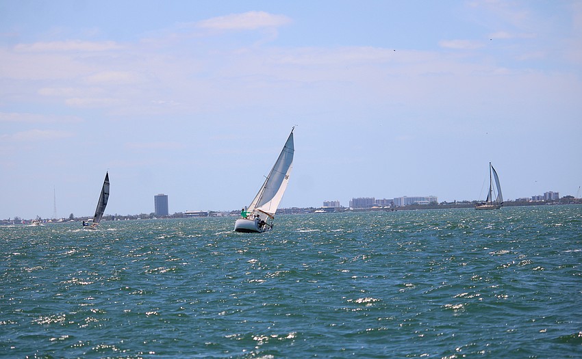 Even with relatively mild winds, sailors had to be prepared to offset the pitching of Sarasota Bay's waters.