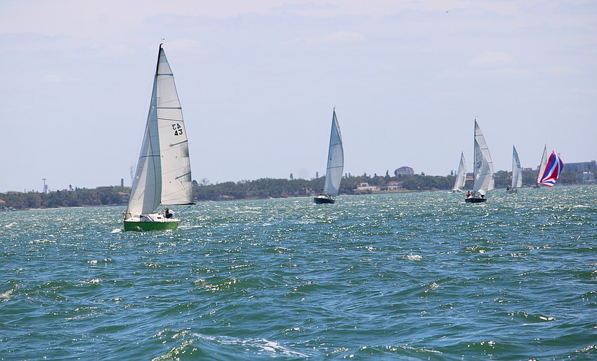 Winds picked up periodically throughout the afternoon regatta on Sarasota Bay, bringing with them fresh batches of vessels reaching the first marker.