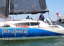 The team aboard the "Triple Threat," captained by John Novak, rounds the first marker of the Bird Key Yacht Club's annual Sarasota Bay Cup regatta on April 11.