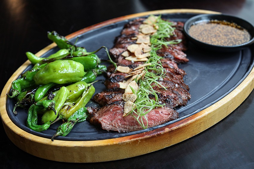 The 10 oz. Wagyu Skirt Steak ($68) at Kojo comes with shishito peppers.