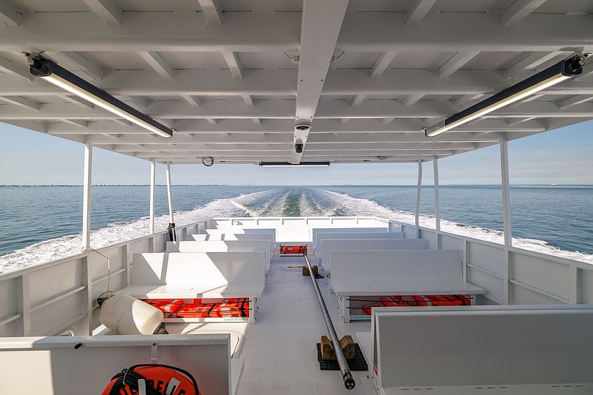 The Manatee Belle has an enclosed design, while the other two vessels in the Gulf Islands Ferry service are open-air.