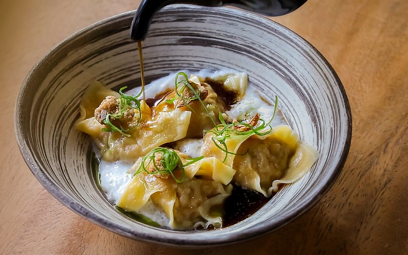 Kojo's incredibly delish truffled chicken wontons ($14).