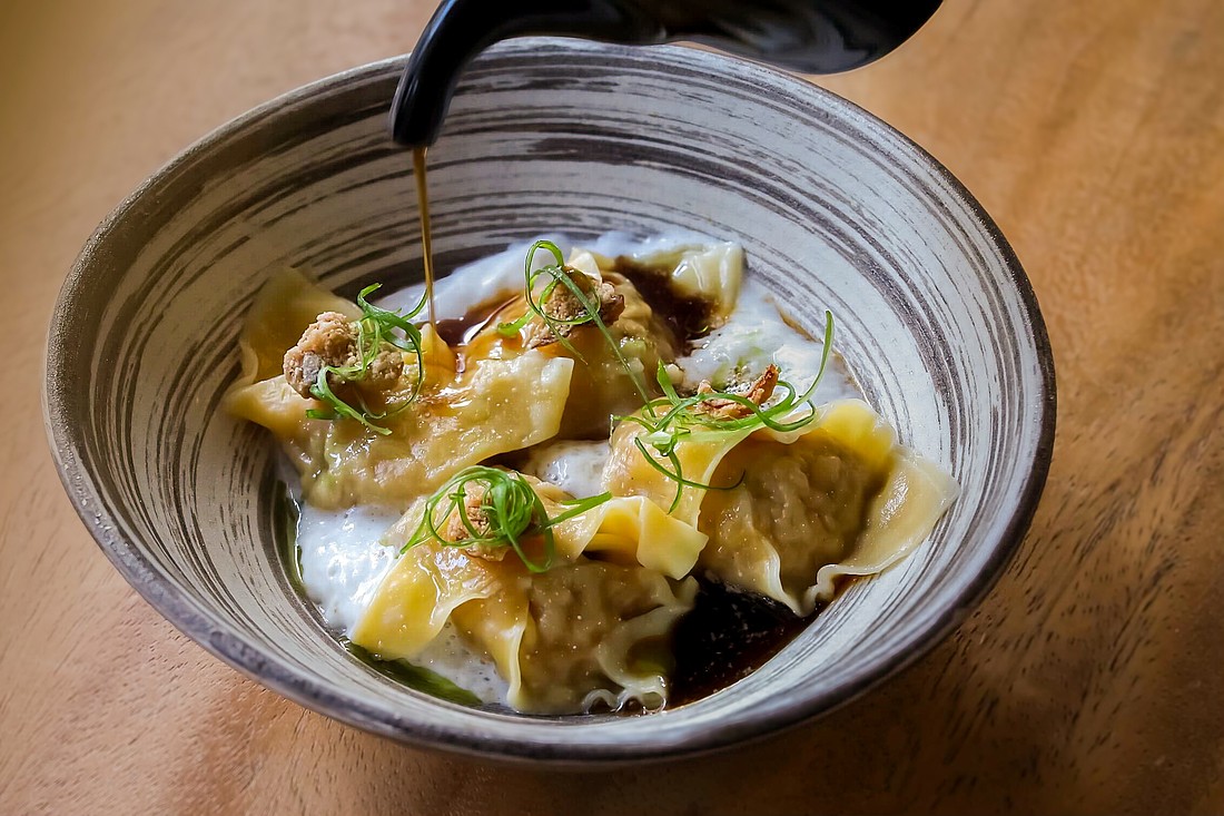 Kojo's incredibly delish truffled chicken wontons ($14).