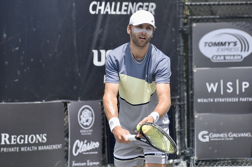 Stefan Dostanic goes into his serving motion. The 24-year-old American, who played for USC and Wake Forest, lost the title match to Wu Yibing,  a Bradenton resident.