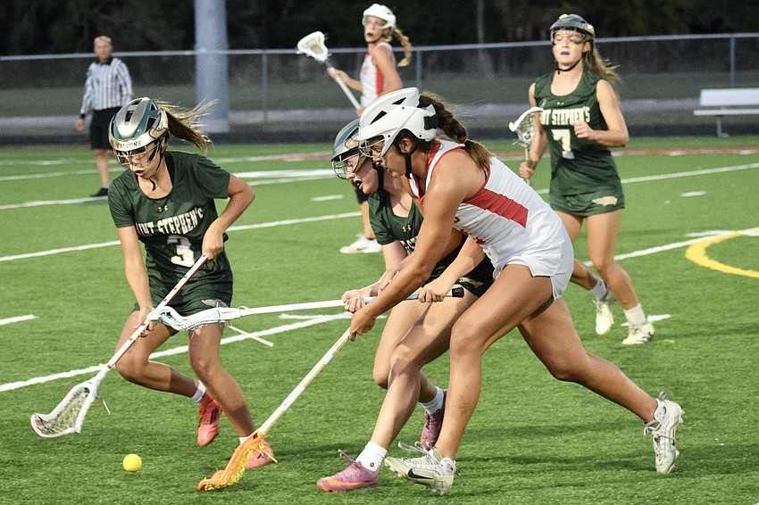 Gabby Ulrich (right), a midfielder, scored the 150th goal of her high school career against Saint Stephen's Episcopal in the district semifinals.