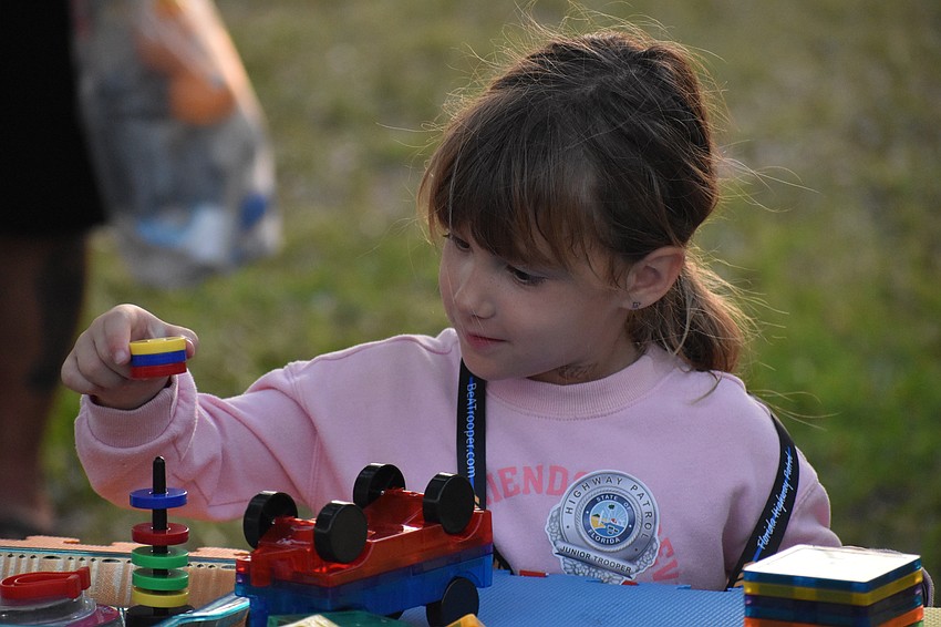 Cali Panton, 5, explores magnetism.