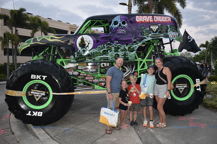 Cory Gallagher, his kids Paislee Gallagher, 10, Brooks Gallagher, 6, Brantley Gallagher, 12, and his wife Kaitlyn Gallagher, enjoy the Grave Digger.