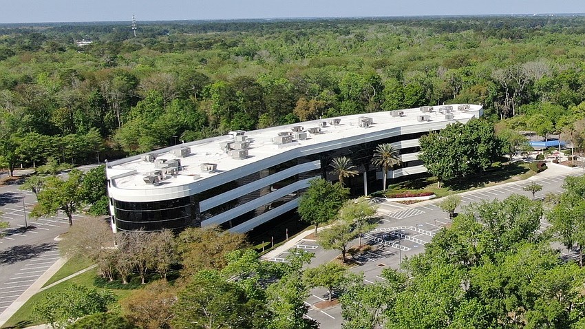 Jacksonville-based NAI Hallmark describes the structure as fully furnished with a “plug-and-play office environment with workstations, conference and training rooms, collaborative spaces, and a built-out cafeteria—designed for immediate occupancy and operational efficiency.”