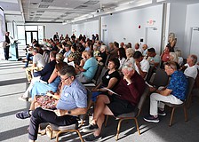 Facilitator David Brain presents findings of the first St. Armands visioning session to the audience.