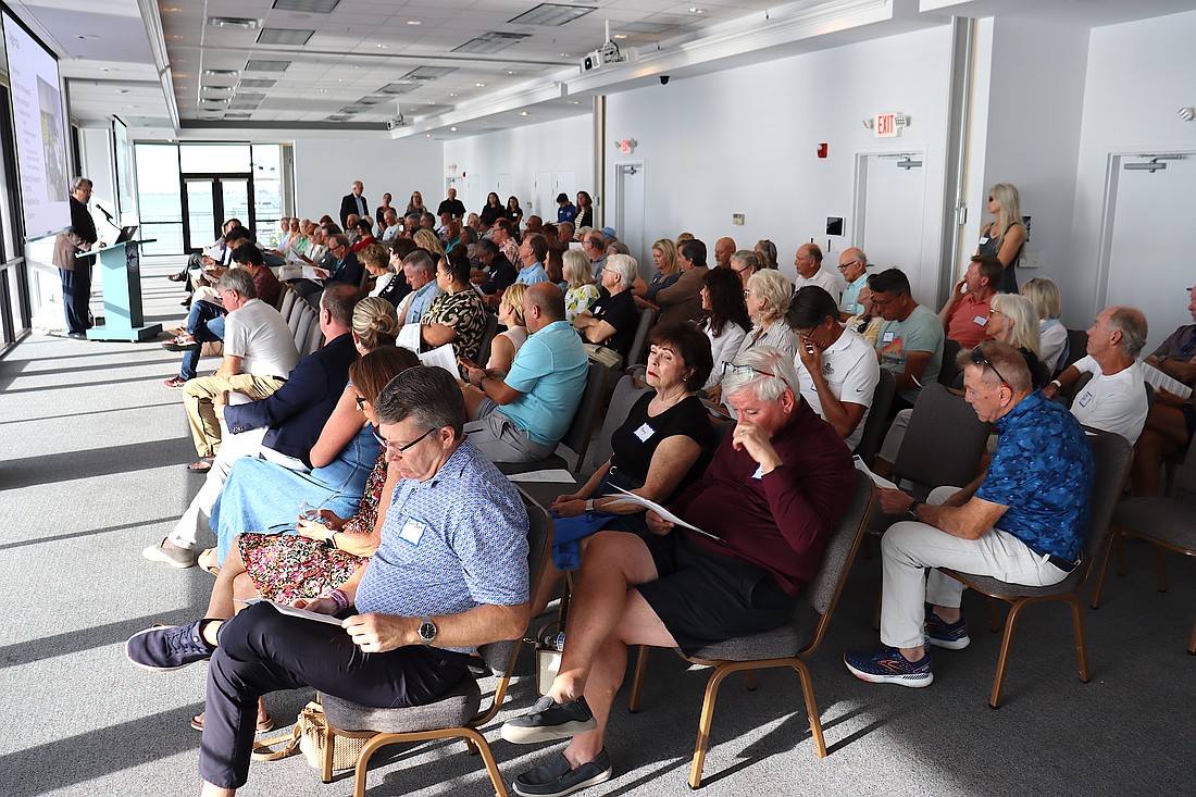 Facilitator David Brain presents findings of the first St. Armands visioning session to the audience.