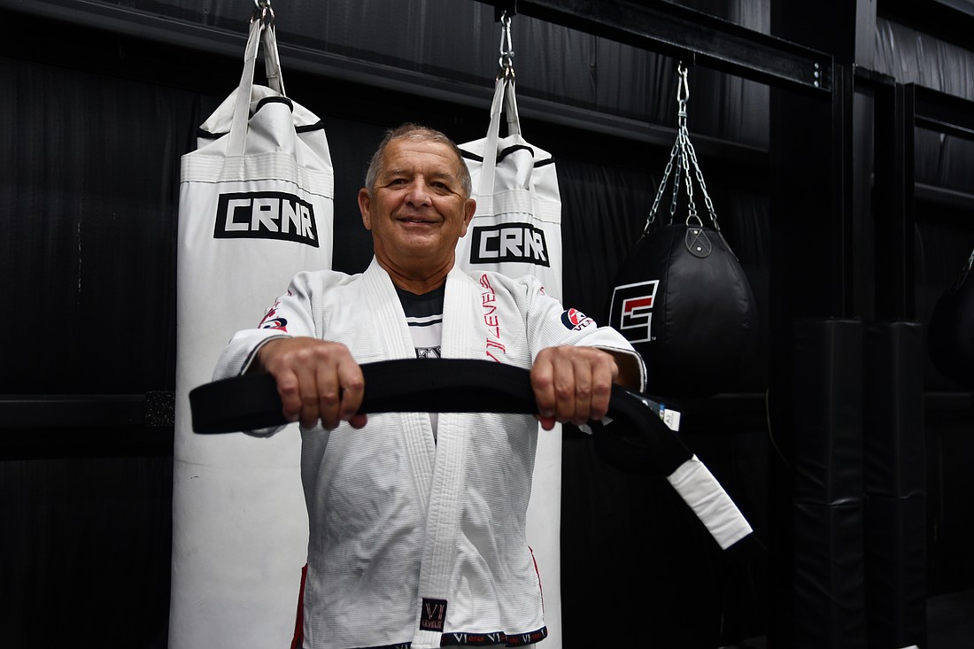 Paul Laniosz has accomplished his decades-old dream of learning jiu-jitsu and has remained dedicated to the craft for 12 years, earning his black belt.