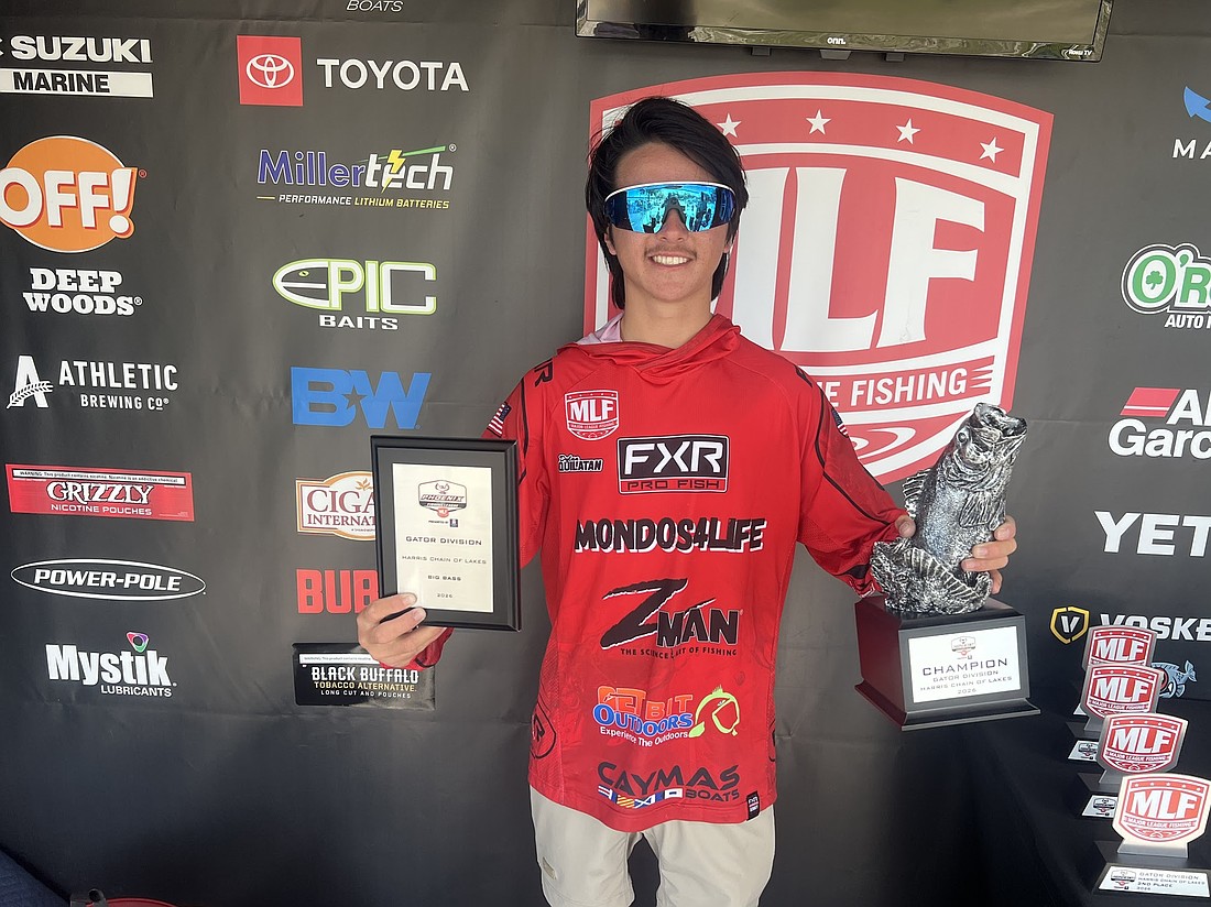 Windermere's Dylan Quilatan celebrated winning the Phoenix Bass Fishing League Event at Harris Chain of Lakes.