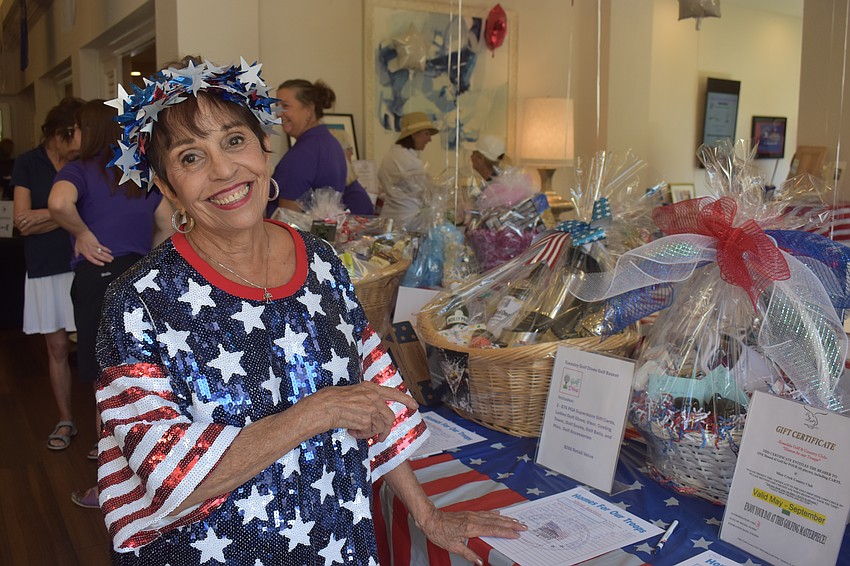 Rosedale's Rosemary Montana, a volunteer at the Rosedale Golf Classic for Homes for Our Troops, says she loves how involved and happy everyone is at the event.