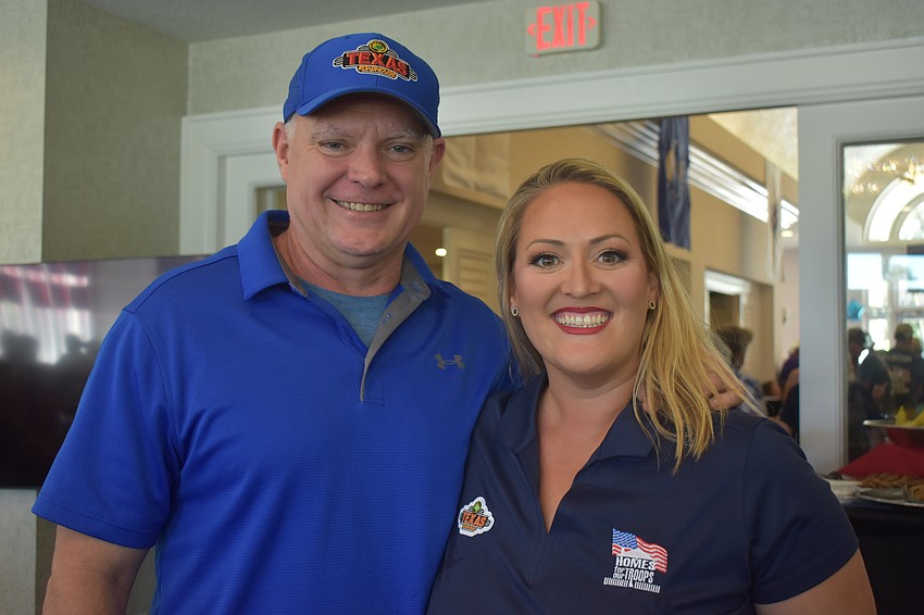 Chris Hoagland and Naomi Erickson of Texas Roadhouse are proud to represent the company that has been a longtime supporter and sponsor of Homes for Our Troops.