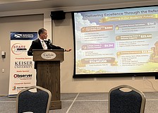 Terry Connor speaks during the State of the Community luncheon.