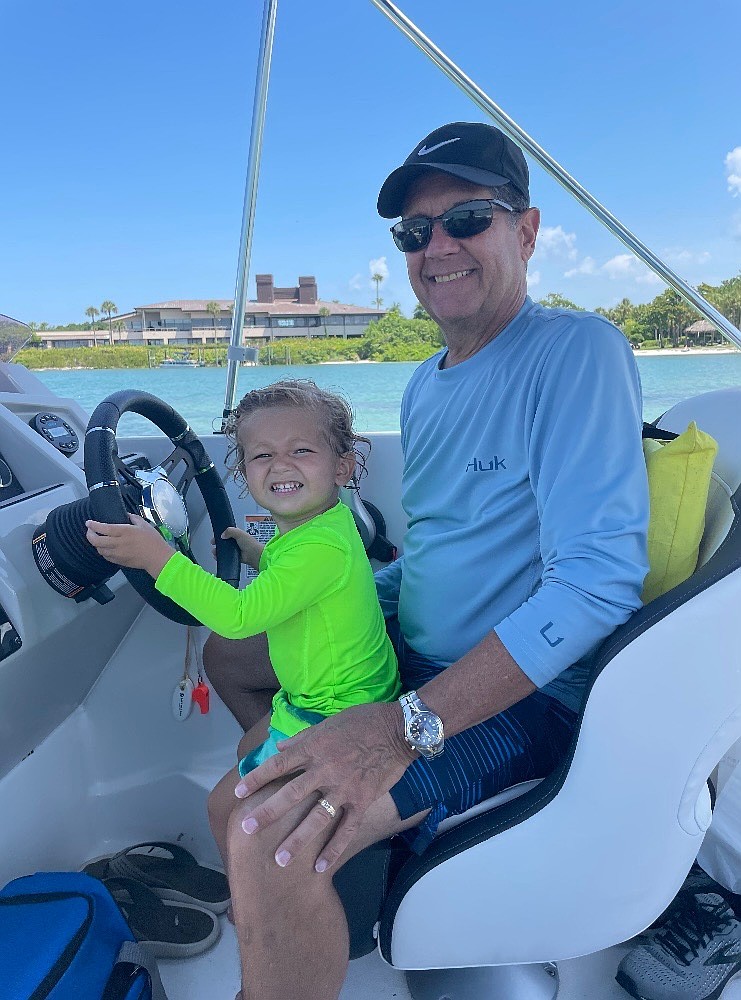 Ron Cornella sails with his grandchild Asher Zimmerman.