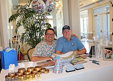 Couch LBK co-founders Noel Ladd — who happened to be celebrating his birthday — and Ken Rushing connect with community members at the entrance to the 20th annual Meet Greet Eat social. The Longboat Key Chamber of Commerce organized the April 14 networking event at The Resort at Longboat Key Club.