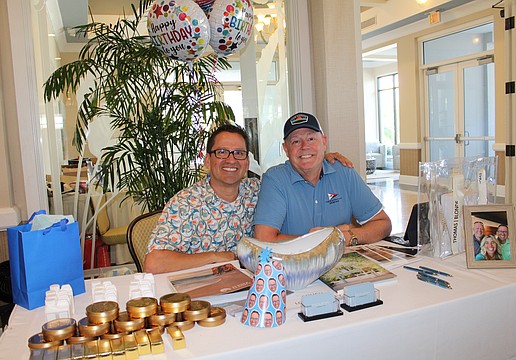 Couch LBK co-founders Noel Ladd — who happened to be celebrating his birthday — and Ken Rushing connect with community members at the entrance to the 20th annual Meet Greet Eat social. The Longboat Key Chamber of Commerce organized the April 14 networking event at The Resort at Longboat Key Club.