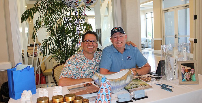 Couch LBK co-founders Noel Ladd — who happened to be celebrating his birthday — and Ken Rushing connect with community members at the entrance to the 20th annual Meet Greet Eat social. The Longboat Key Chamber of Commerce organized the April 14 networking event at The Resort at Longboat Key Club.