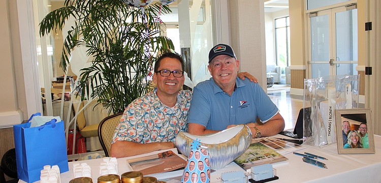 Couch LBK co-founders Noel Ladd — who happened to be celebrating his birthday — and Ken Rushing connect with community members at the entrance to the 20th annual Meet Greet Eat social. The Longboat Key Chamber of Commerce organized the April 14 networking event at The Resort at Longboat Key Club.