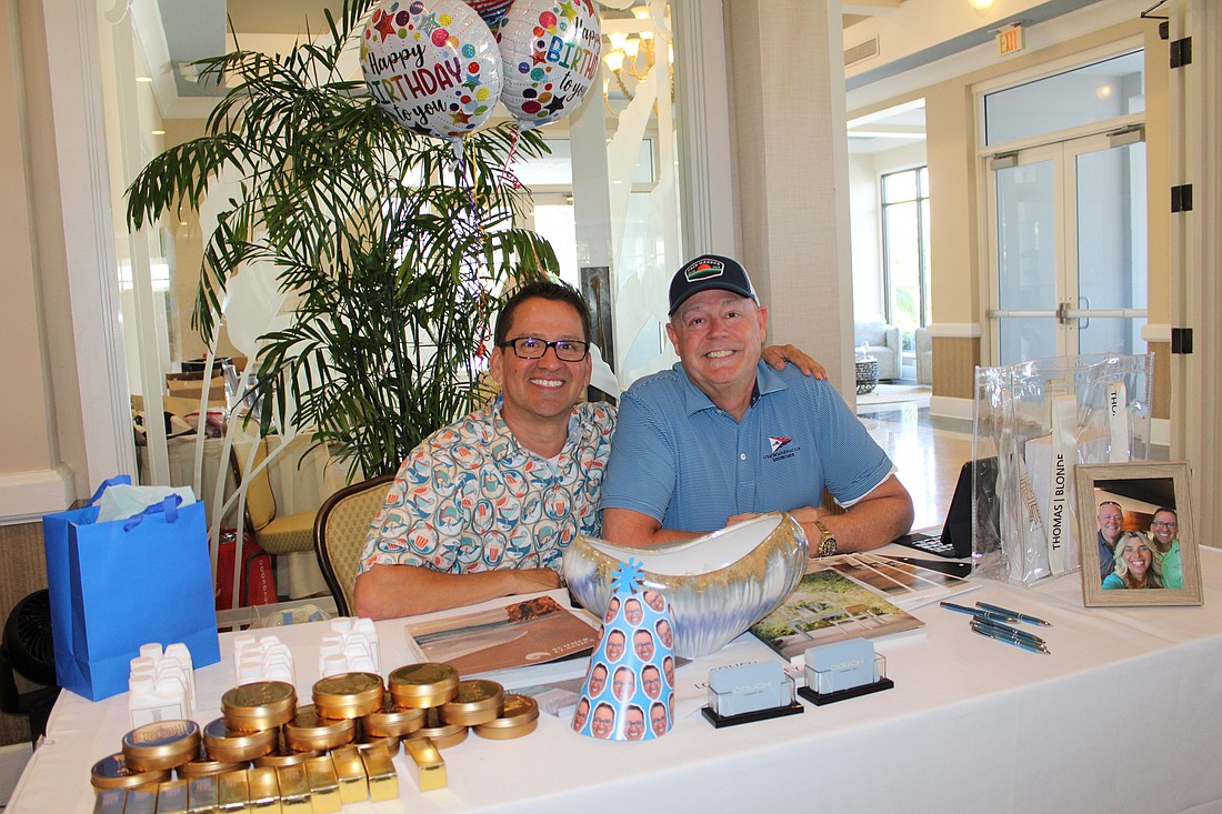 Couch LBK co-founders Noel Ladd — who happened to be celebrating his birthday — and Ken Rushing connect with community members at the entrance to the 20th annual Meet Greet Eat social. The Longboat Key Chamber of Commerce organized the April 14 networking event at The Resort at Longboat Key Club.