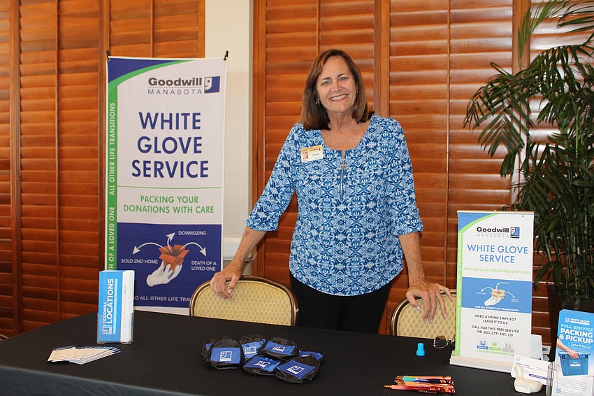Donna Evans with Goodwill Manasota chats with Meet Greet Eat patrons about local services and locations. She said some people have been surprised to learn they can donate any items, not just books, at the new Goodwill bookstore and donation site on Longboat Key.