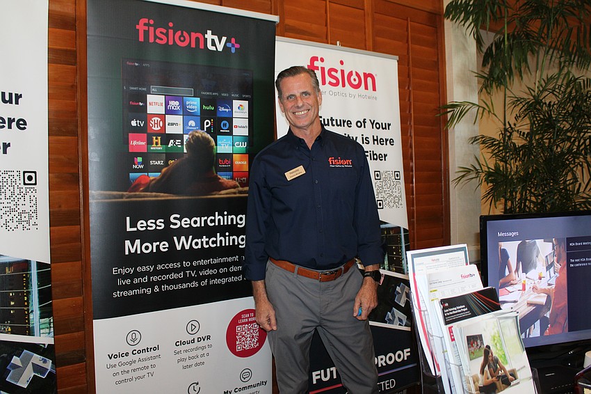 Charlie Murphy tells Meet Greet Eat attendees about Hotwire's services available on Longboat Key.