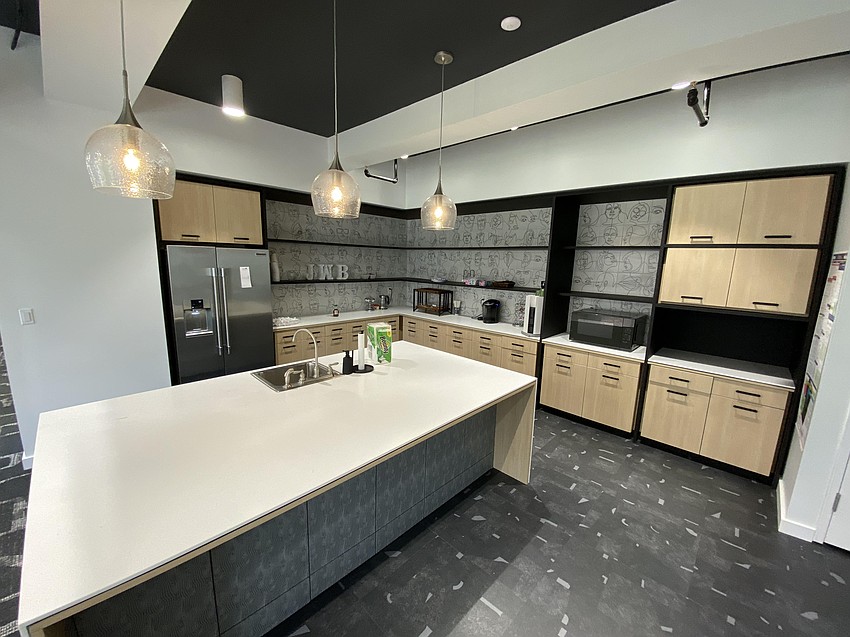 About 105 employees of JWB Real Estate Capital work in the company's headquarters at The Greenleaf building at 208 N. Laura. JWB spent $17 million restoring and modernizing the historic building.