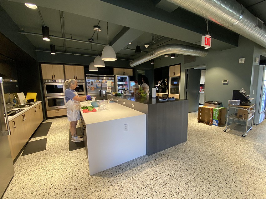A kitchen and pantry provide free meals and snacks to employees of JWB Real Estate Capital in the company's headquarters at The Greenleaf historic building in Downtown Jacksonville.
