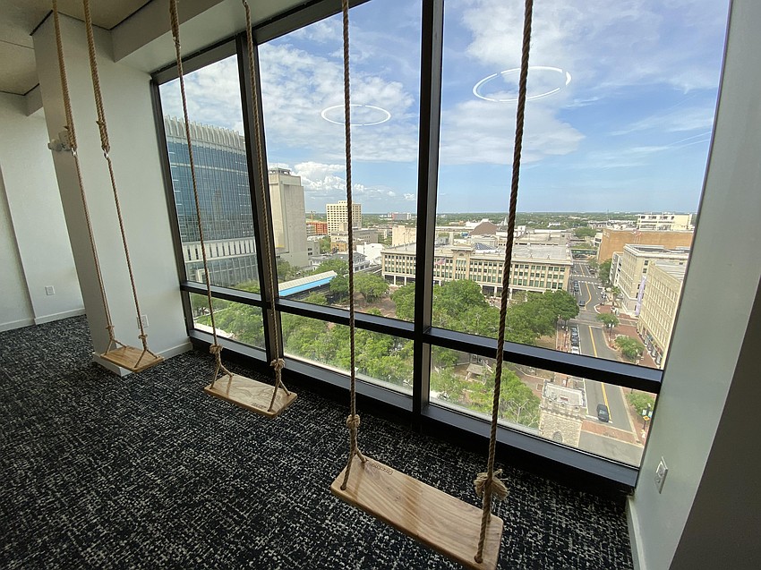 A set of swings offers a place to take in the view from an upper floor of The Greenleaf building at 208 N. Laura St. in Downtown Jacksonville. JWB Real Estate Capital, which restored the historic building, occupies five floors of the 12-story structure.