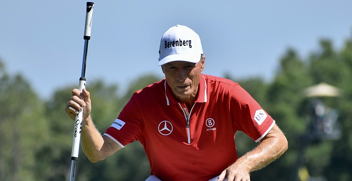 Bernhard Langer reads the 10th green before attempting a putt. The 47-time winner on the PGA Tour Champions and two-time Masters Tournament champion shot six under par in his opening round.