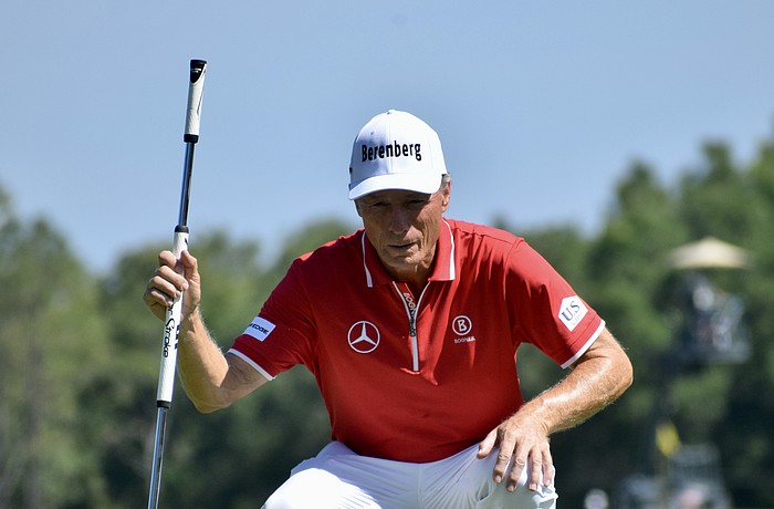 Bernhard Langer reads the 10th green before attempting a putt. The 47-time winner on the PGA Tour Champions and two-time Masters Tournament champion shot six under par in his opening round.