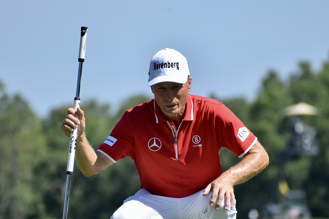 Bernhard Langer reads the 10th green before attempting a putt. The 47-time winner on the PGA Tour Champions and two-time Masters Tournament champion shot six under par in his opening round.