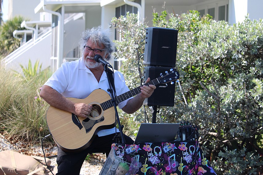 Guitarist and singer John Rinell brings his musical talents to Longboat Harbour's seasonal farewell party on April 16 at the Sutton Place beachfront property.