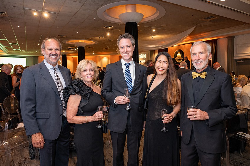 CEO Philip Tavill, Elaine Hershberger, Reid Buchanan, April Lee and Rod Hershberger