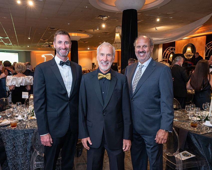 Keith Johnson, Rod Hershberger and CEO Philip Tavill