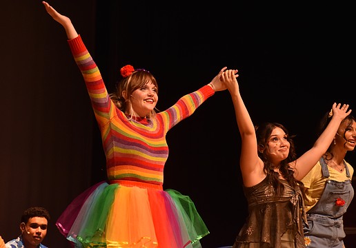 Senior Alexis Huffstutler says she enjoys helping younger students, like freshman Naya Cordero, to come out of their shells and express themselves through acting.