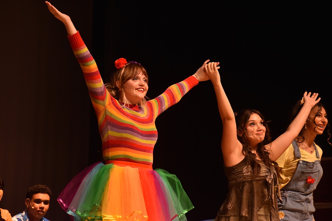 Senior Alexis Huffstutler says she enjoys helping younger students, like freshman Naya Cordero, to come out of their shells and express themselves through acting.