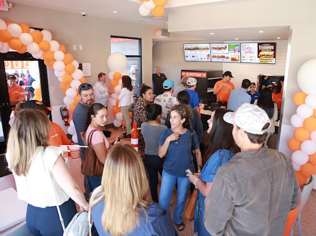 Guests line up inside the new Lutz Whataburger at 25340 Sierra Center Blvd.