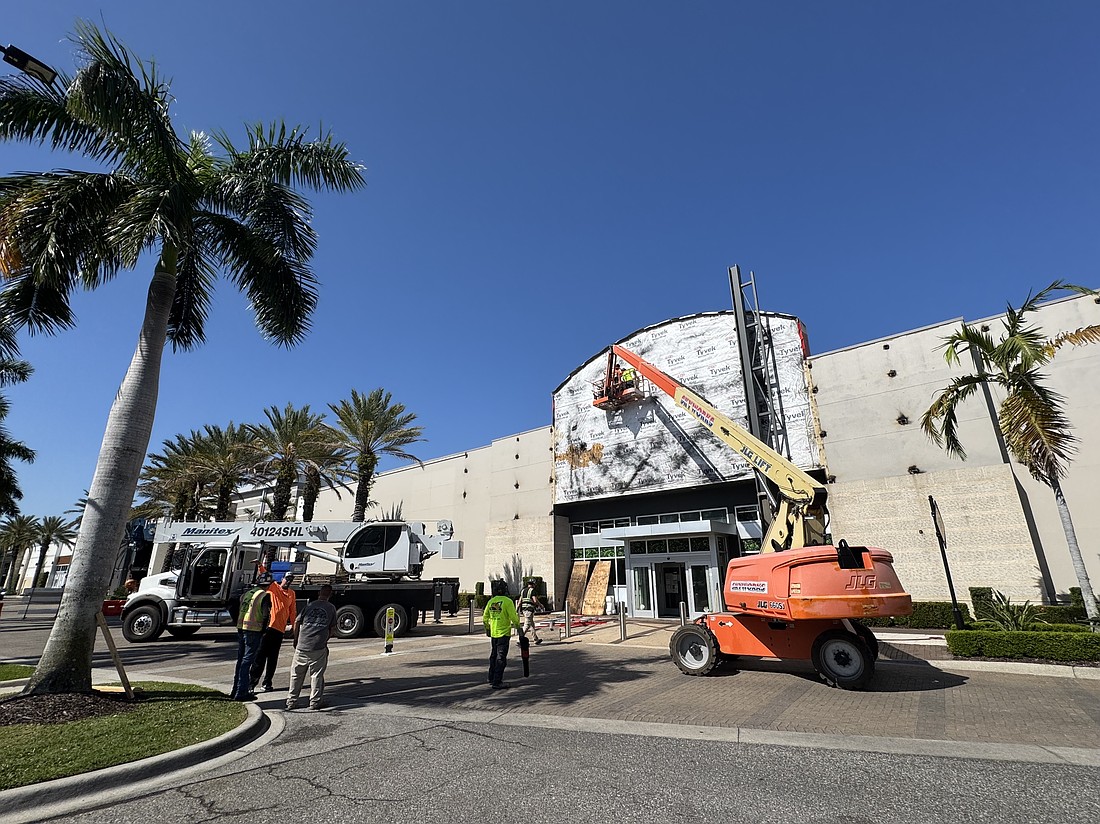 Crews work on the facade at the future Sarasota Ikea store on April 17.
