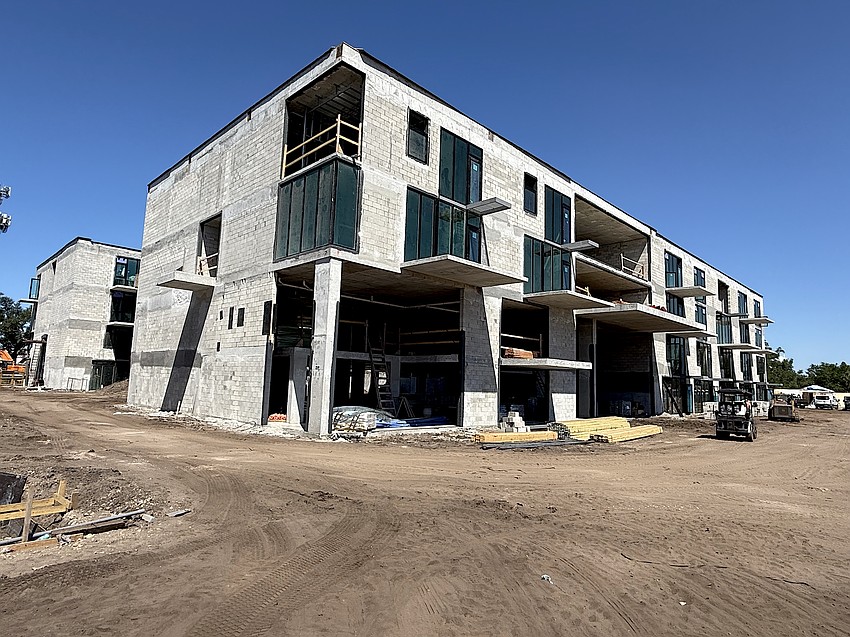 The first two floors of this building at Bath + Racquet Residences & Club is dedicated to private club space including restaurant, fitness center and outdoor lounge overlooking the courts and pool.